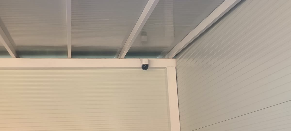 AI camera mounted under a pergola